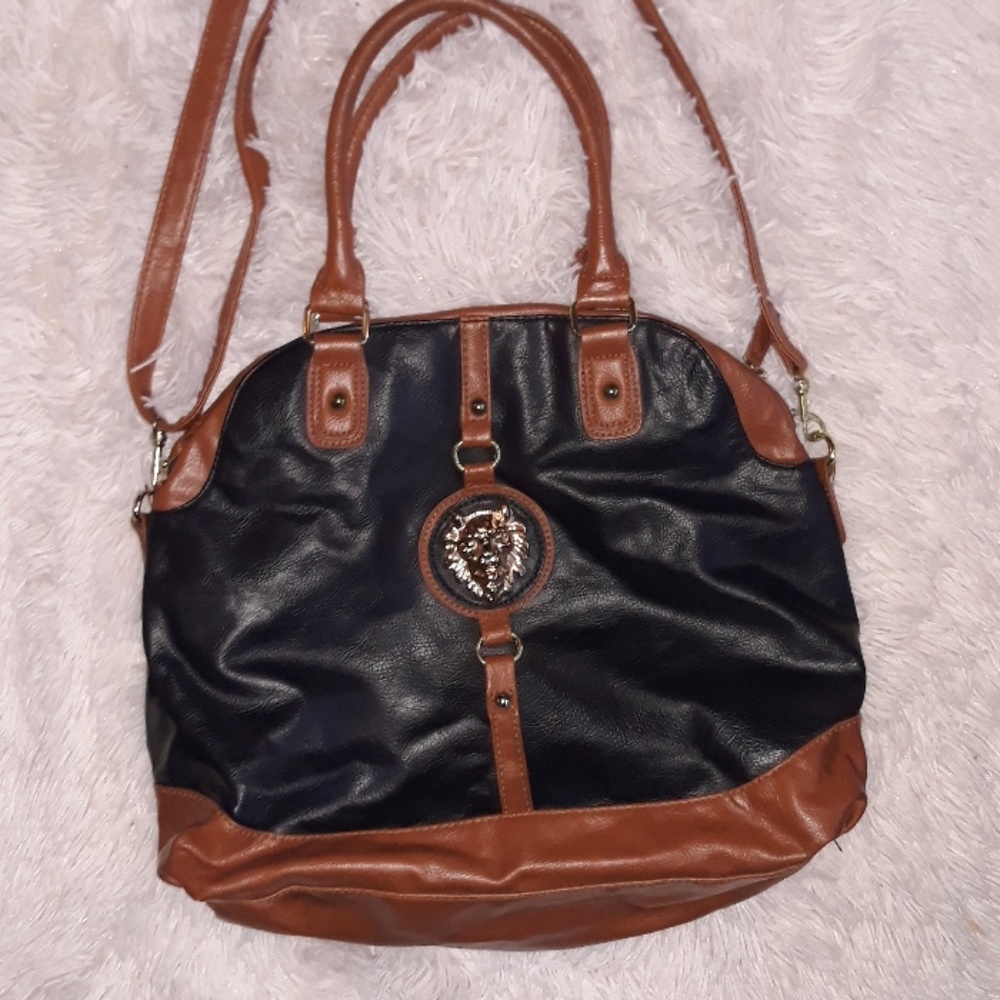 Gold lion hand bag